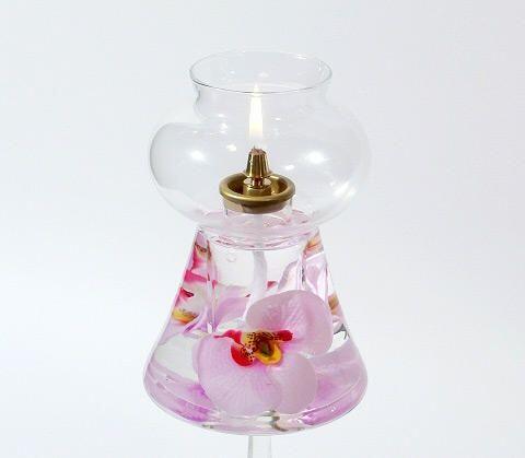 Glas-Windlicht-Leuchte mit Orchideenblüten